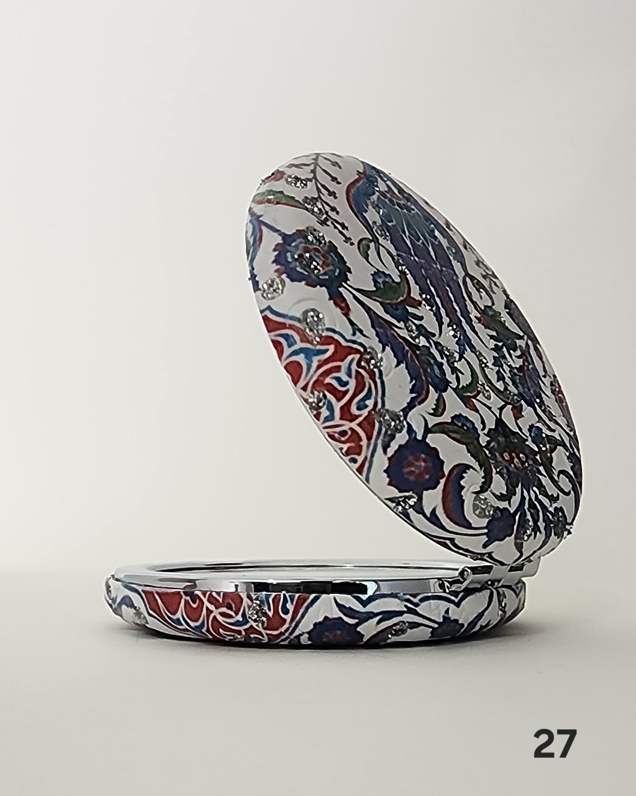 Authentic Moroccan women's multi-shaped/multi-sized mirrors for outdoor use.