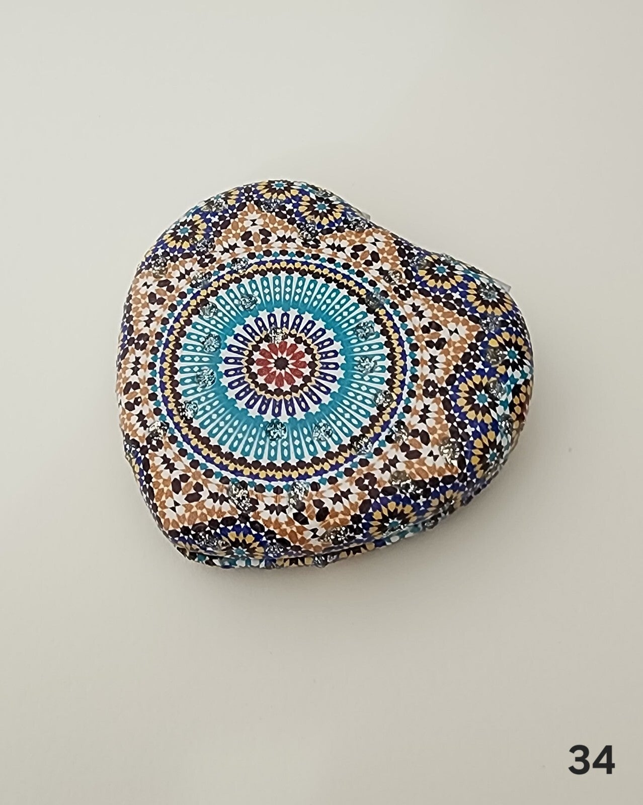 Authentic Moroccan women's multi-shaped/multi-sized mirrors for outdoor use.