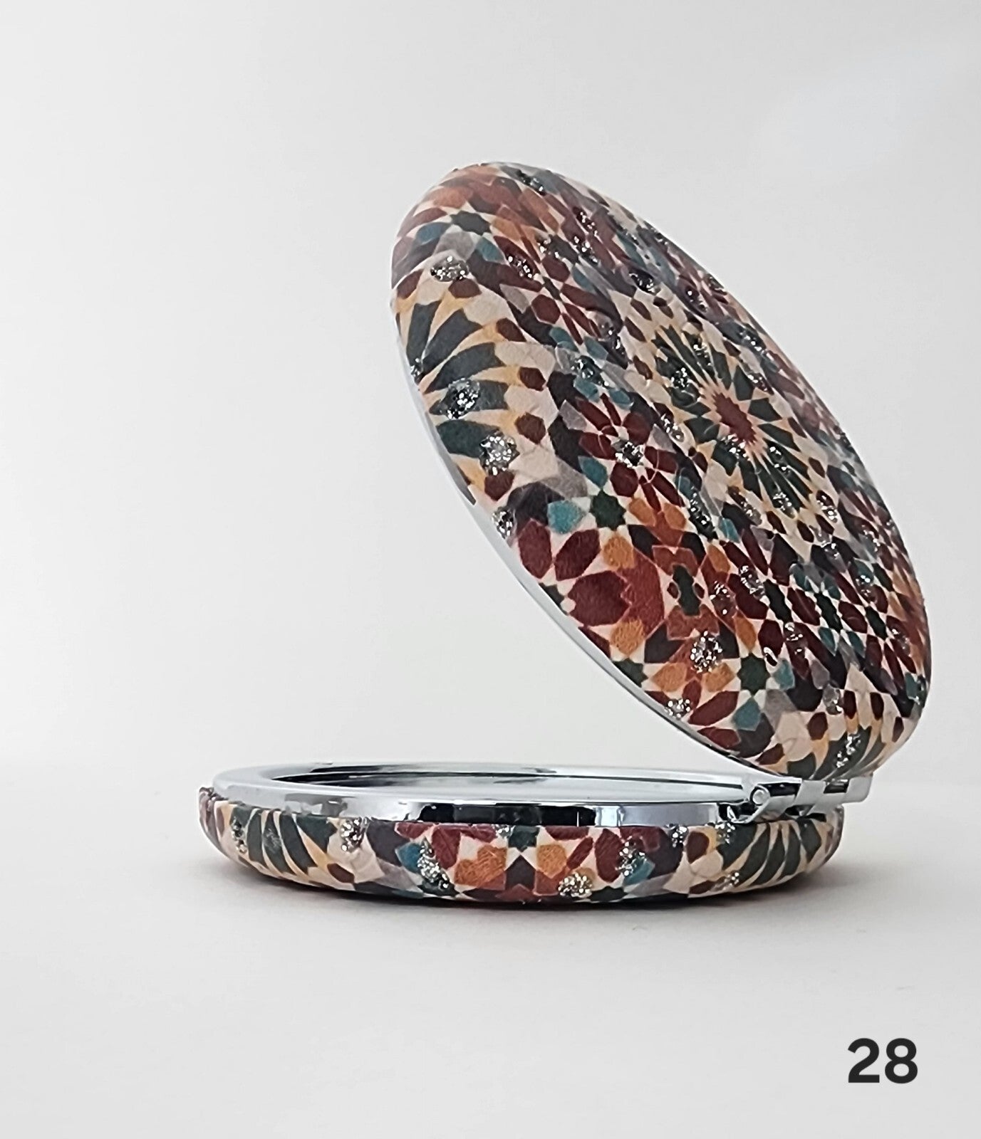 Authentic Moroccan women's multi-shaped/multi-sized mirrors for outdoor use.