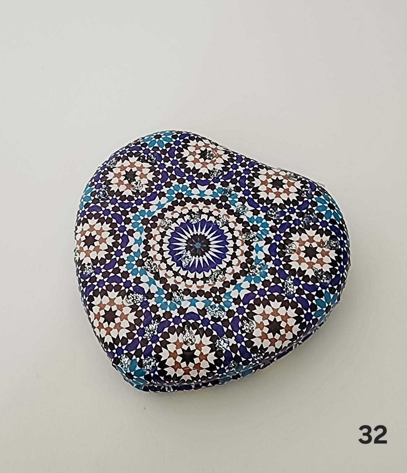 Authentic Moroccan women's multi-shaped/multi-sized mirrors for outdoor use.