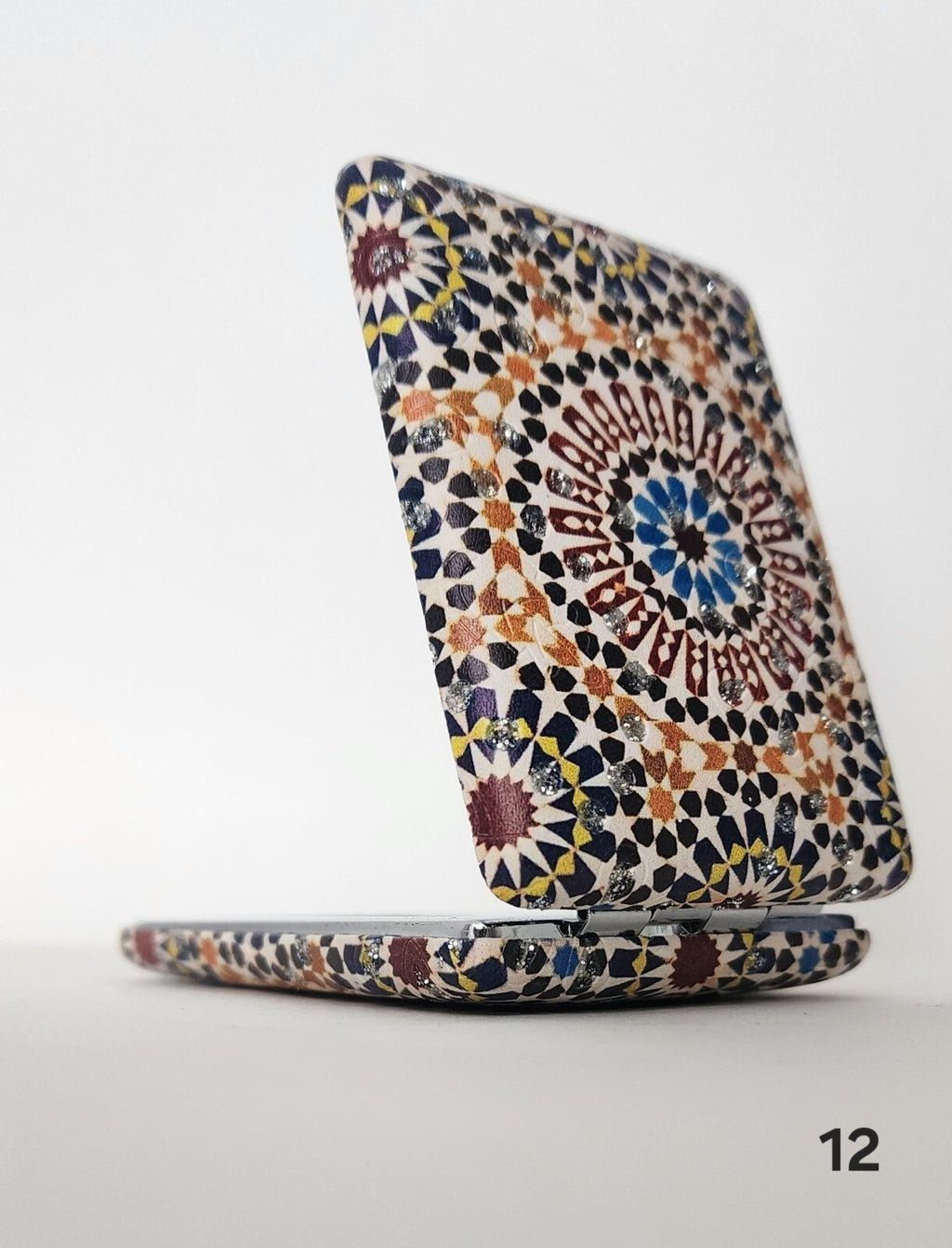 Authentic Moroccan women's multi-shaped/multi-sized mirrors for outdoor use.