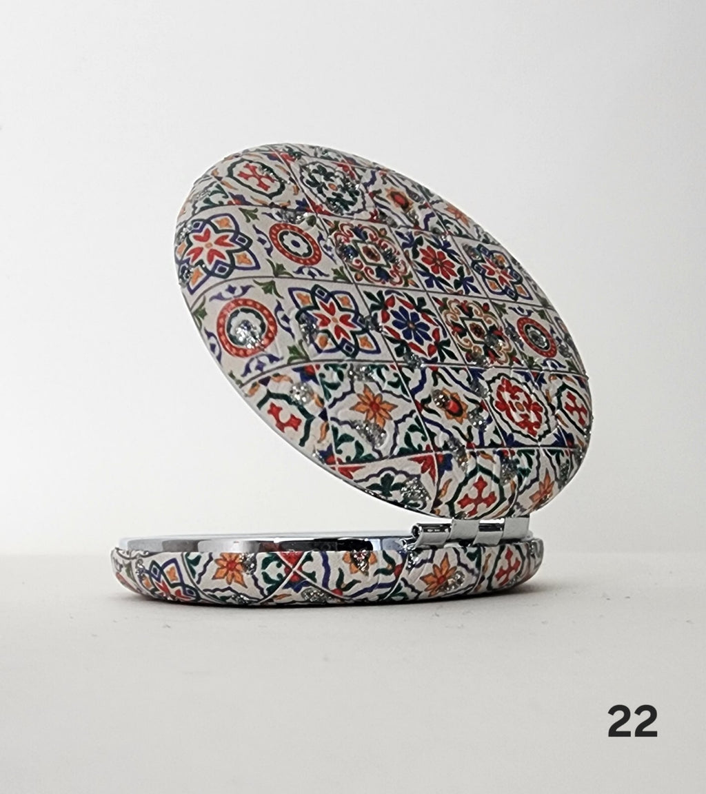 Authentic Moroccan women's multi-shaped/multi-sized mirrors for outdoor use.