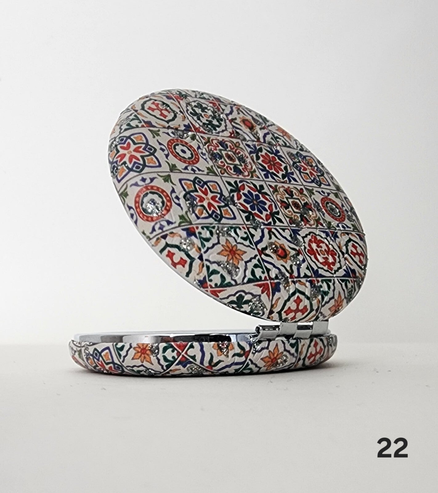 Authentic Moroccan women's multi-shaped/multi-sized mirrors for outdoor use.