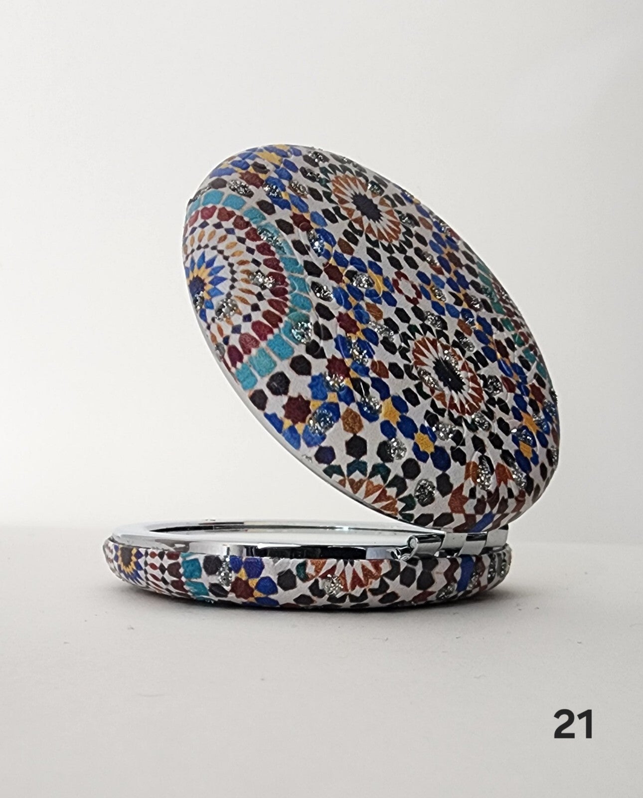 Authentic Moroccan women's multi-shaped/multi-sized mirrors for outdoor use.