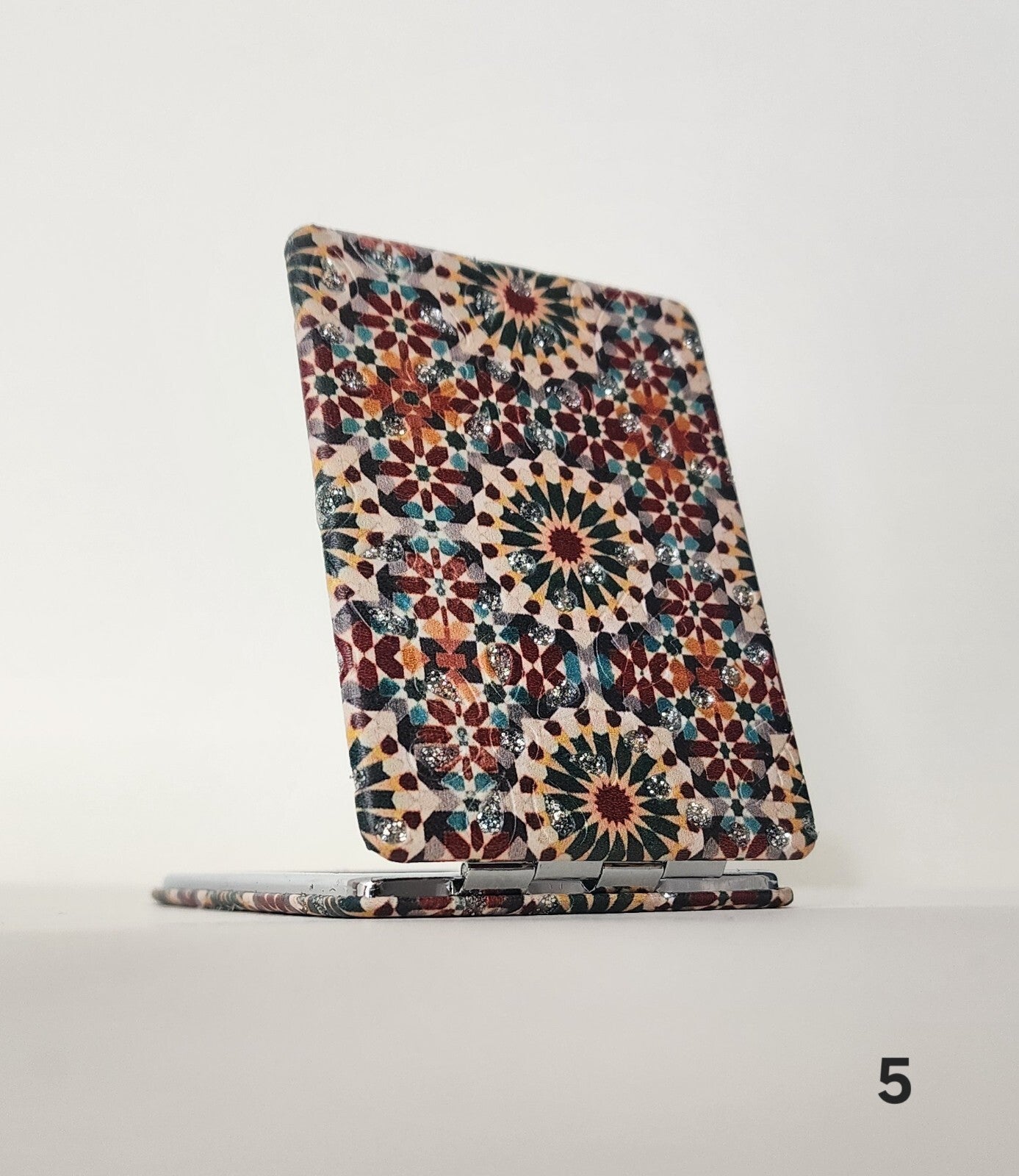 Authentic Moroccan women's multi-shaped/multi-sized mirrors for outdoor use.