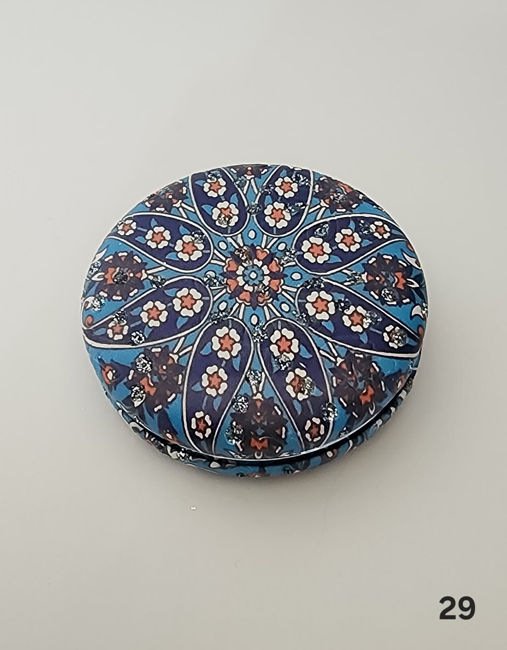 Authentic Moroccan women's multi-shaped/multi-sized mirrors for outdoor use.