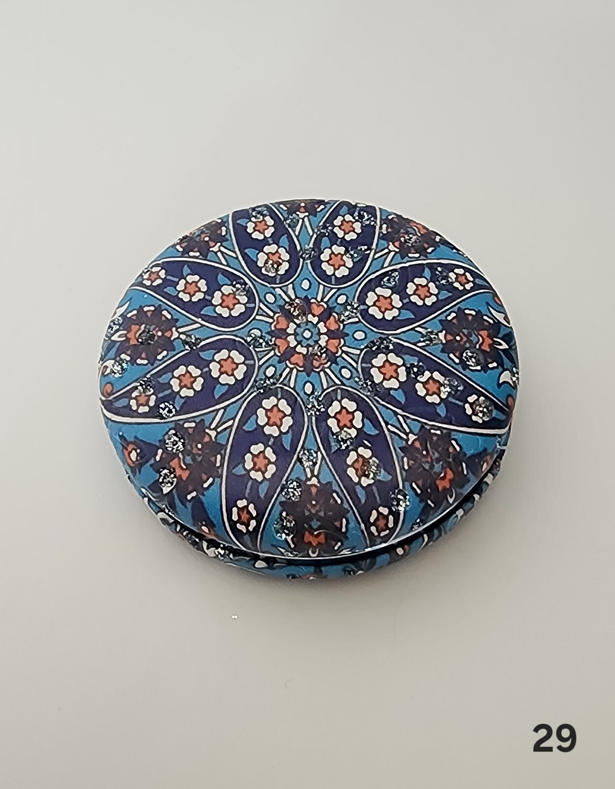 Authentic Moroccan women's multi-shaped/multi-sized mirrors for outdoor use.