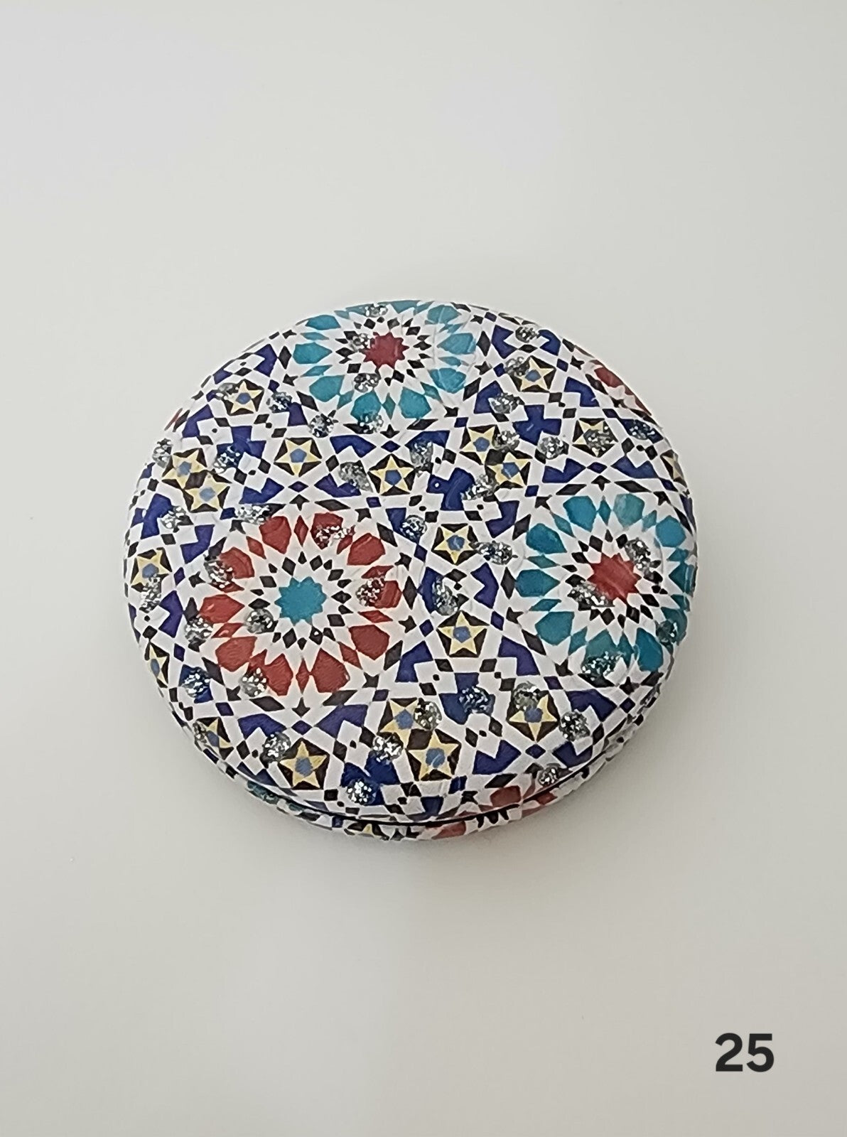 Authentic Moroccan women's multi-shaped/multi-sized mirrors for outdoor use.