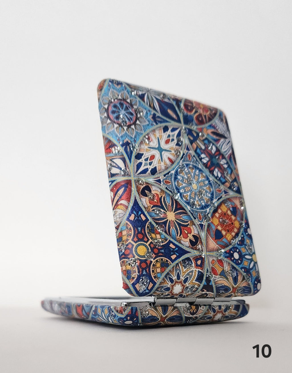 Authentic Moroccan women's multi-shaped/multi-sized mirrors for outdoor use.