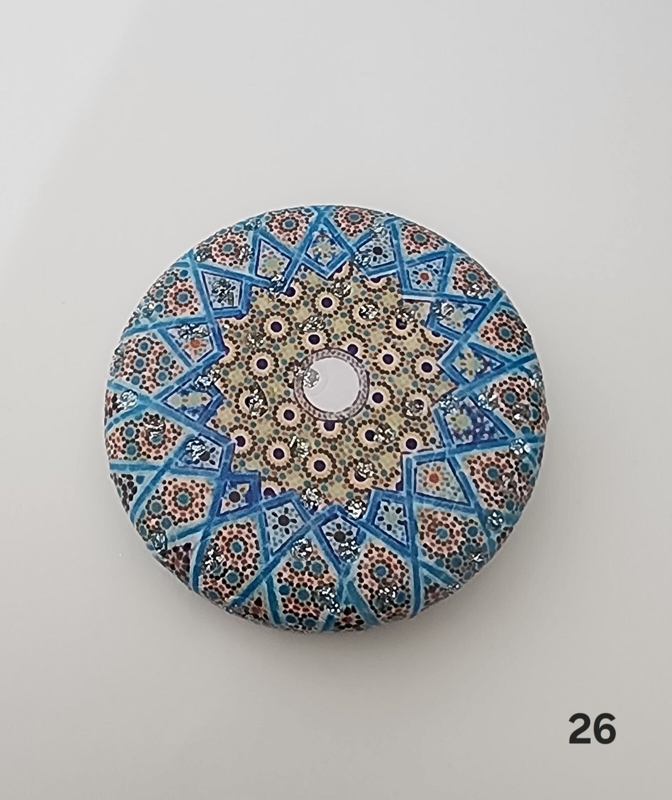 Authentic Moroccan women's multi-shaped/multi-sized mirrors for outdoor use.