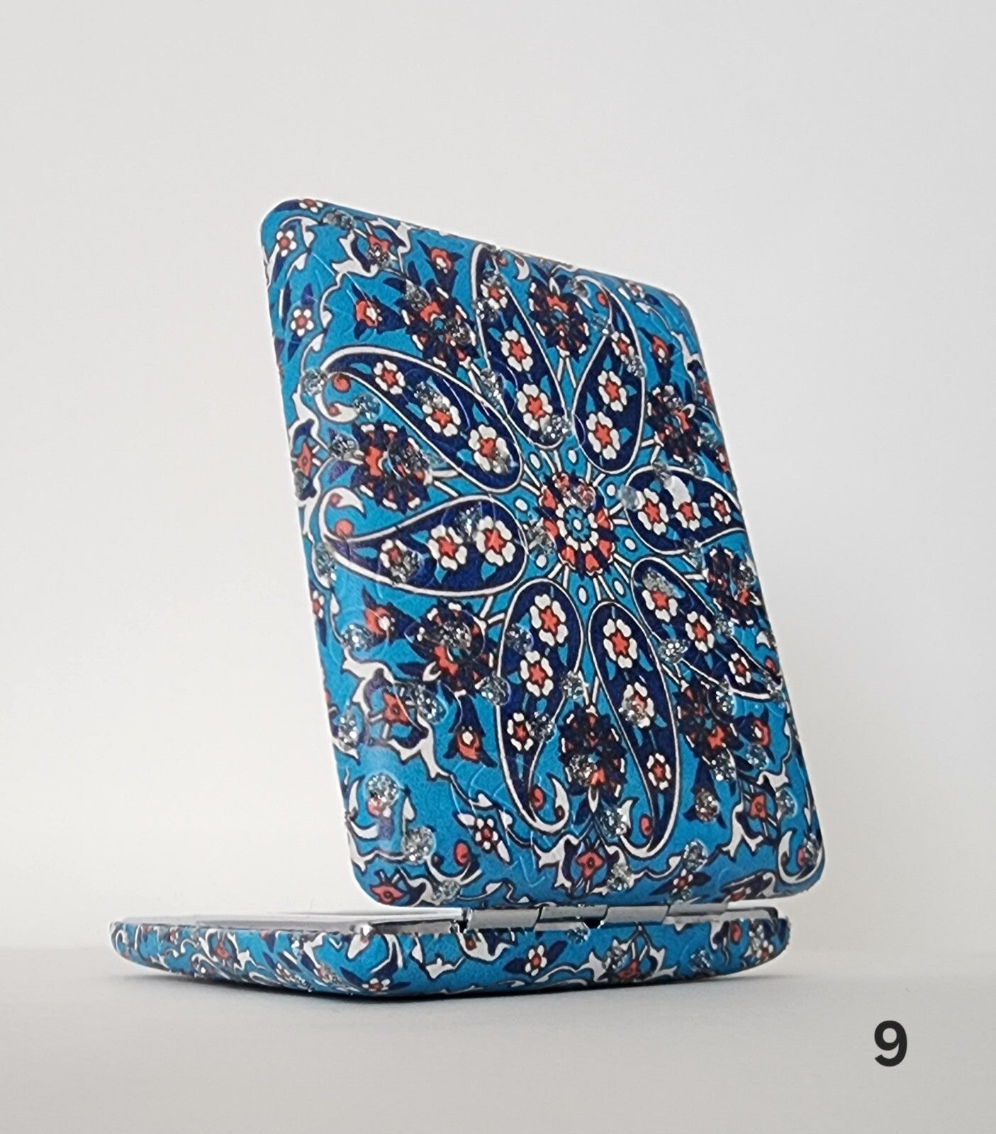 Authentic Moroccan women's multi-shaped/multi-sized mirrors for outdoor use.