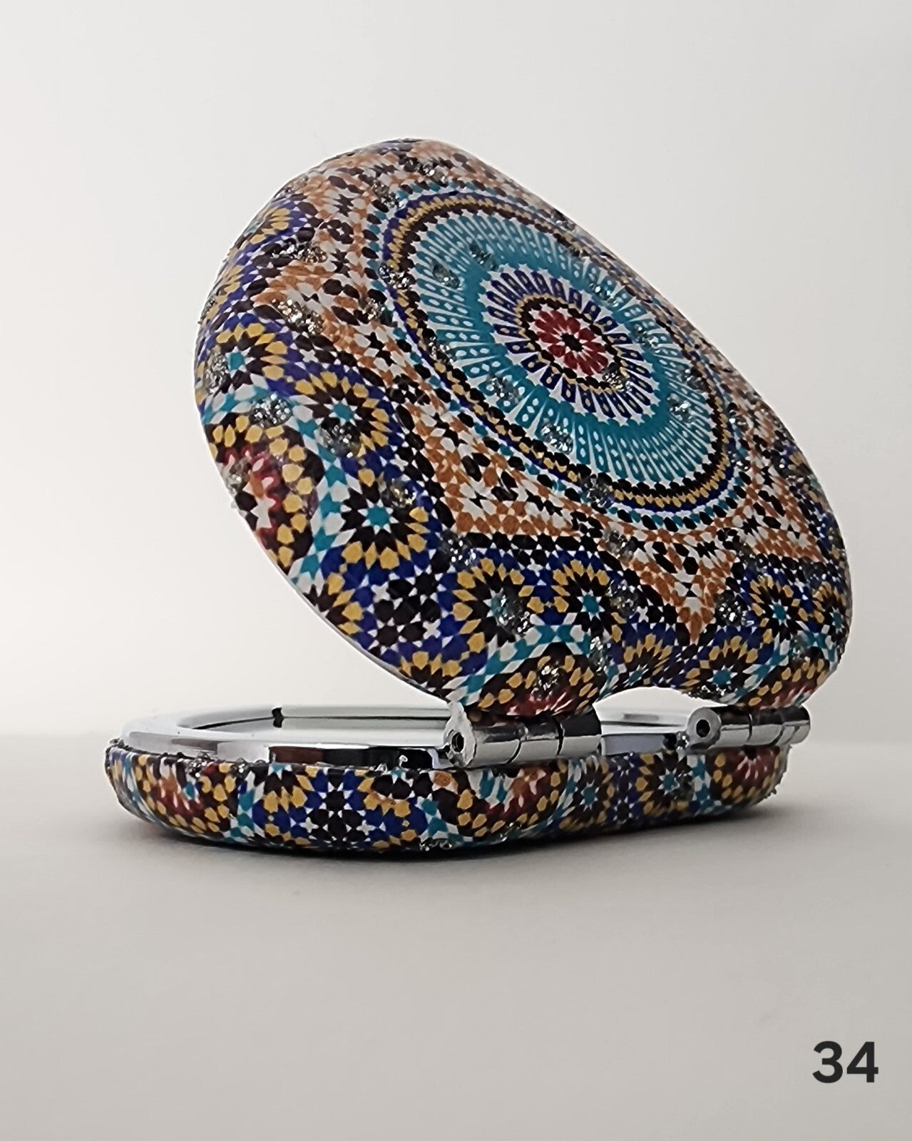 Authentic Moroccan women's multi-shaped/multi-sized mirrors for outdoor use.