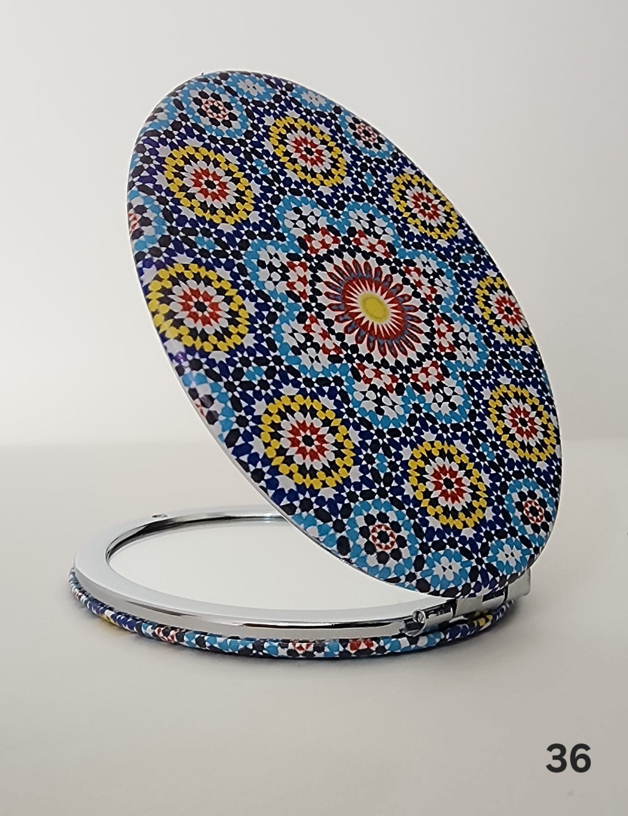 Authentic Moroccan women's multi-shaped/multi-sized mirrors for outdoor use.