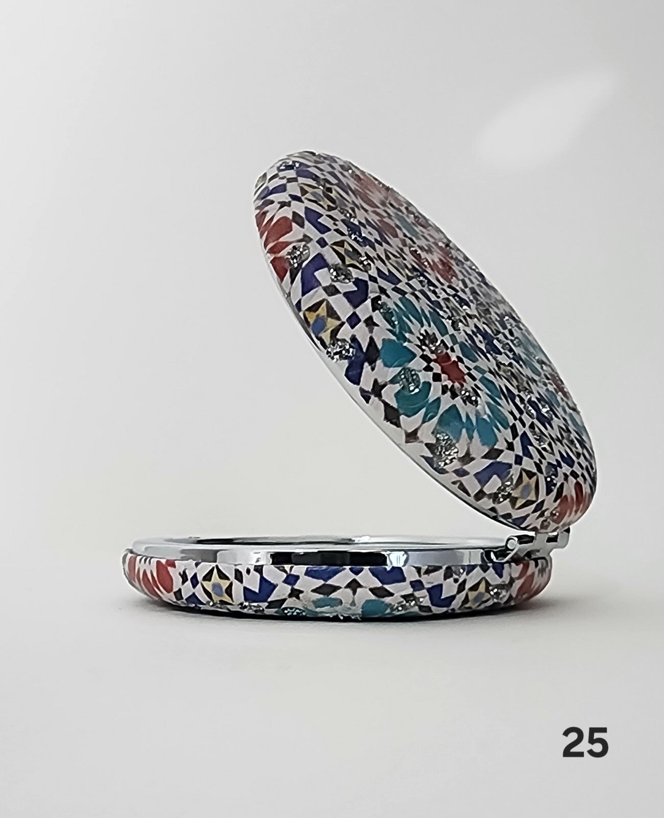 Authentic Moroccan women's multi-shaped/multi-sized mirrors for outdoor use.