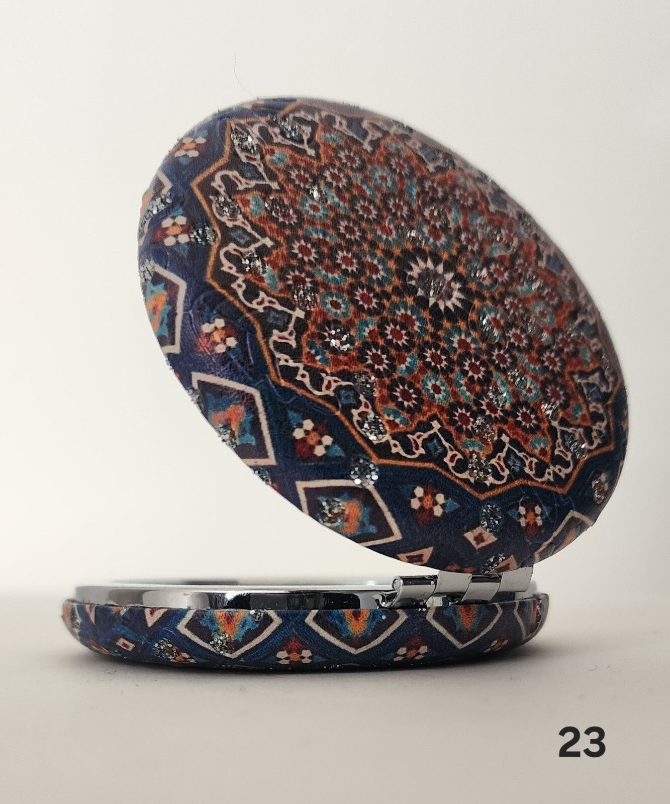 Authentic Moroccan women's multi-shaped/multi-sized mirrors for outdoor use.