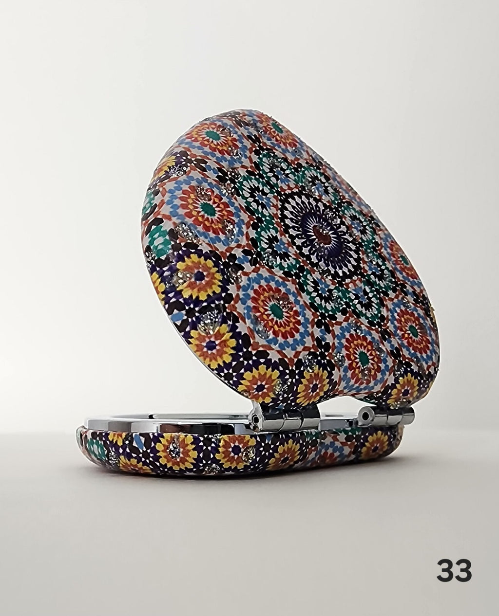 Authentic Moroccan women's multi-shaped/multi-sized mirrors for outdoor use.