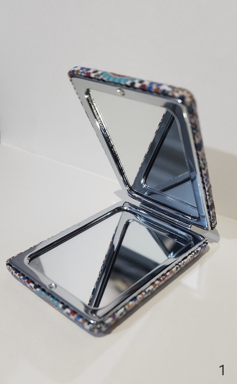 Authentic Moroccan women's multi-shaped/multi-sized mirrors for outdoor use.