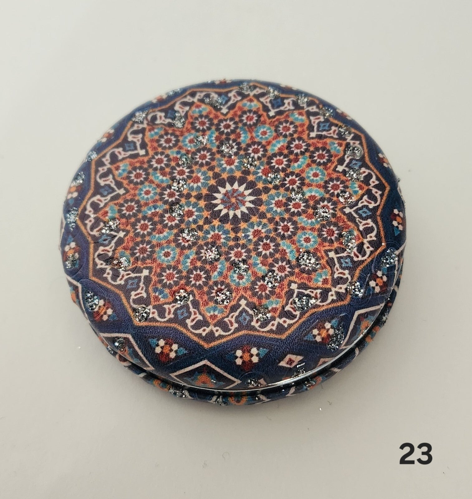 Authentic Moroccan women's multi-shaped/multi-sized mirrors for outdoor use.