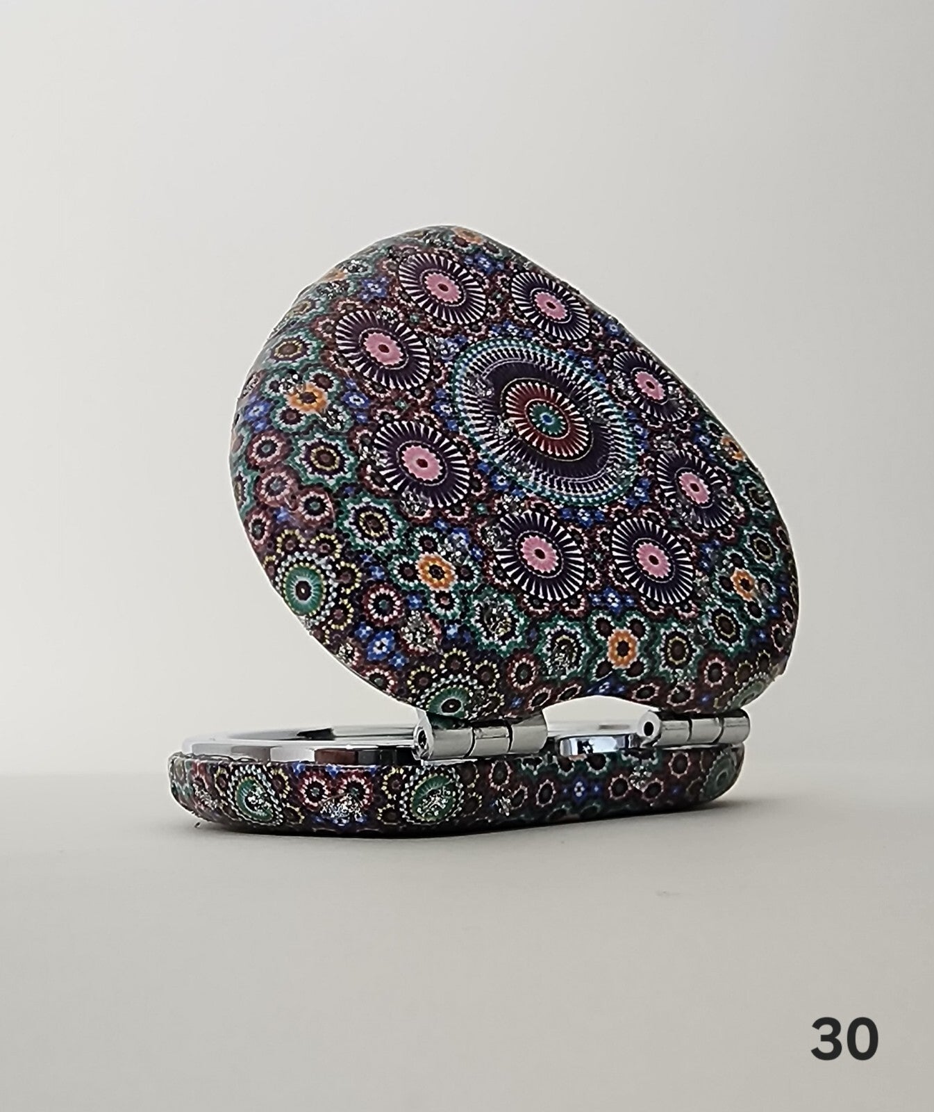 Authentic Moroccan women's multi-shaped/multi-sized mirrors for outdoor use.