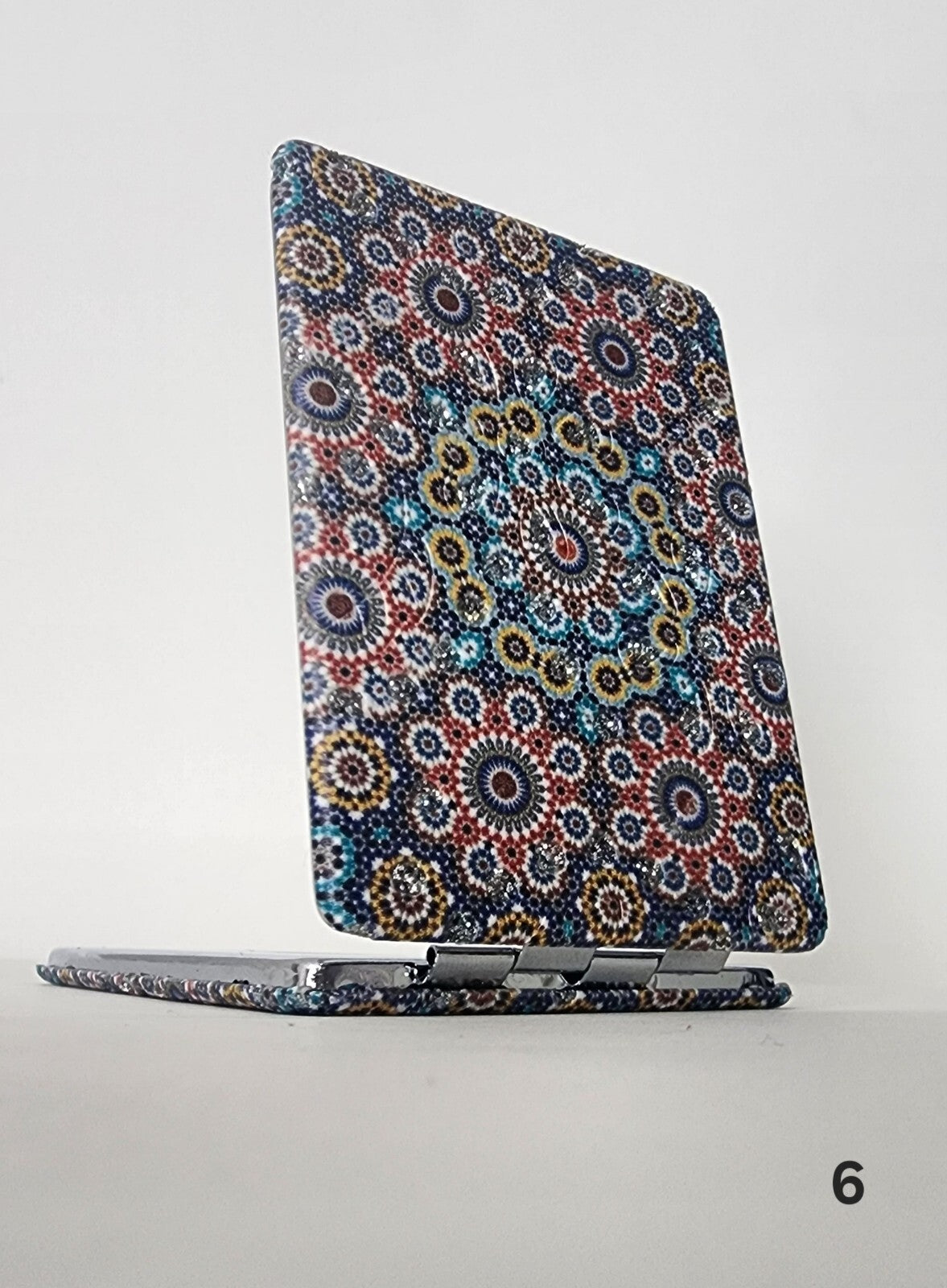 Authentic Moroccan women's multi-shaped/multi-sized mirrors for outdoor use.