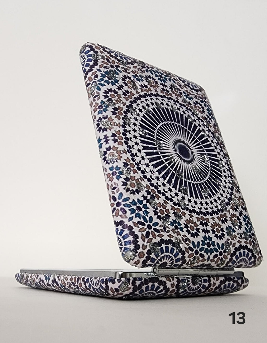 Authentic Moroccan women's multi-shaped/multi-sized mirrors for outdoor use.