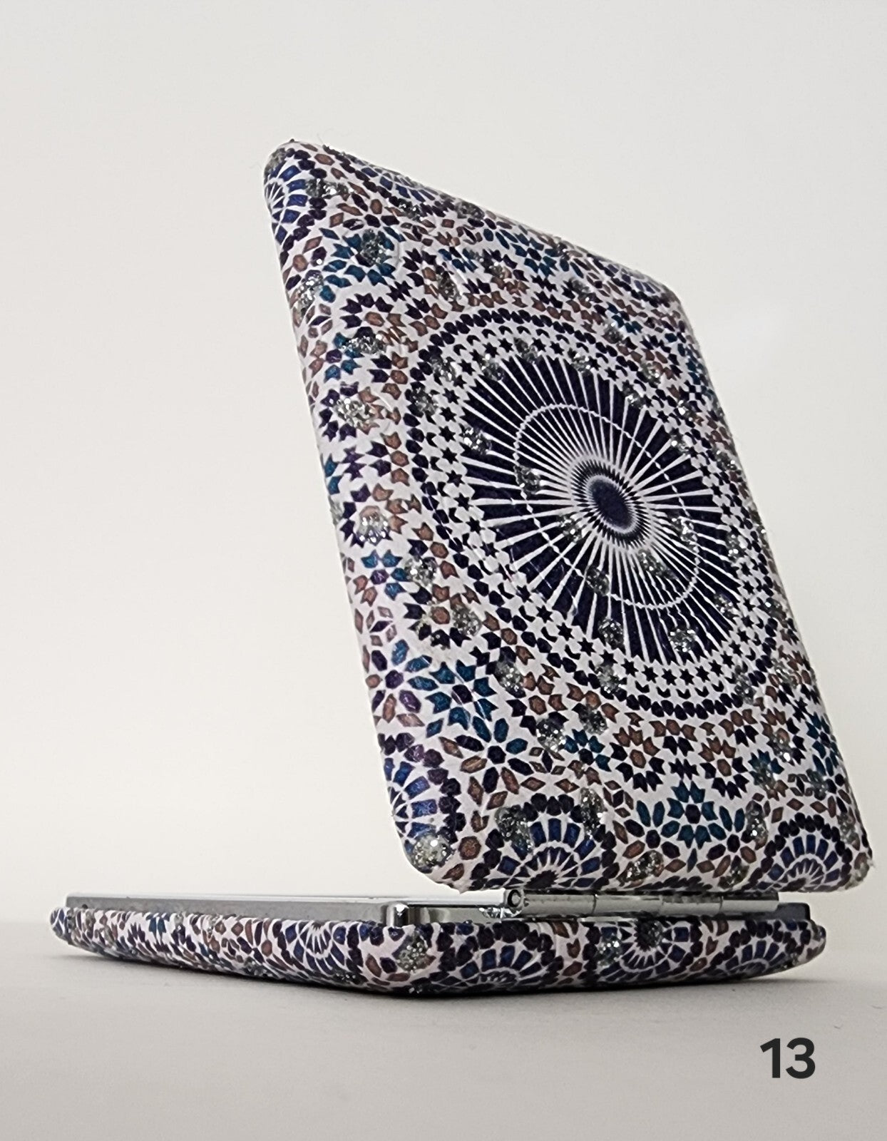 Authentic Moroccan women's multi-shaped/multi-sized mirrors for outdoor use.