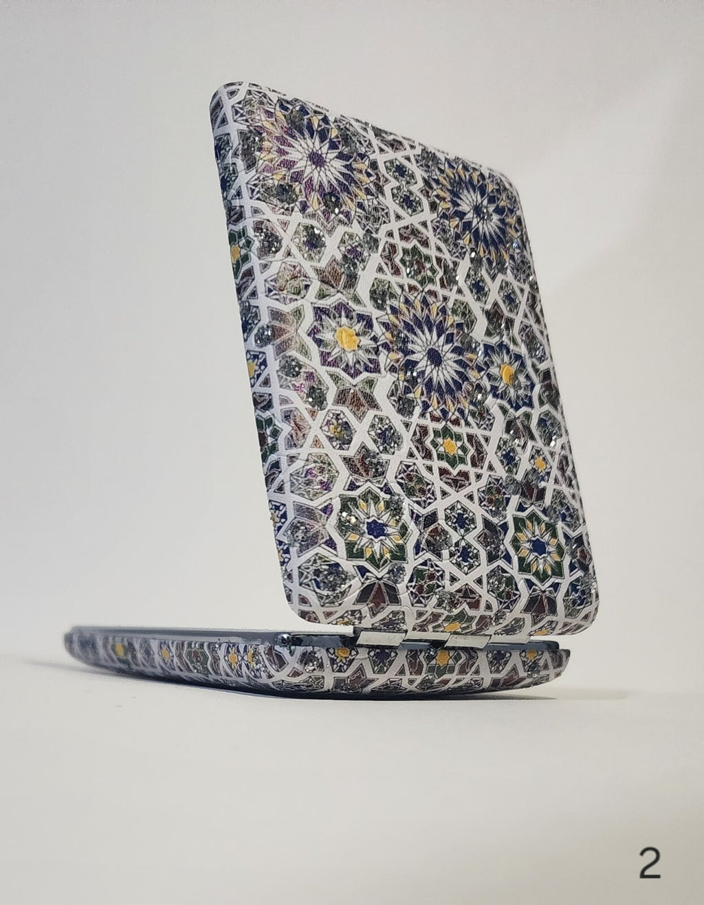 Authentic Moroccan women's multi-shaped/multi-sized mirrors for outdoor use.