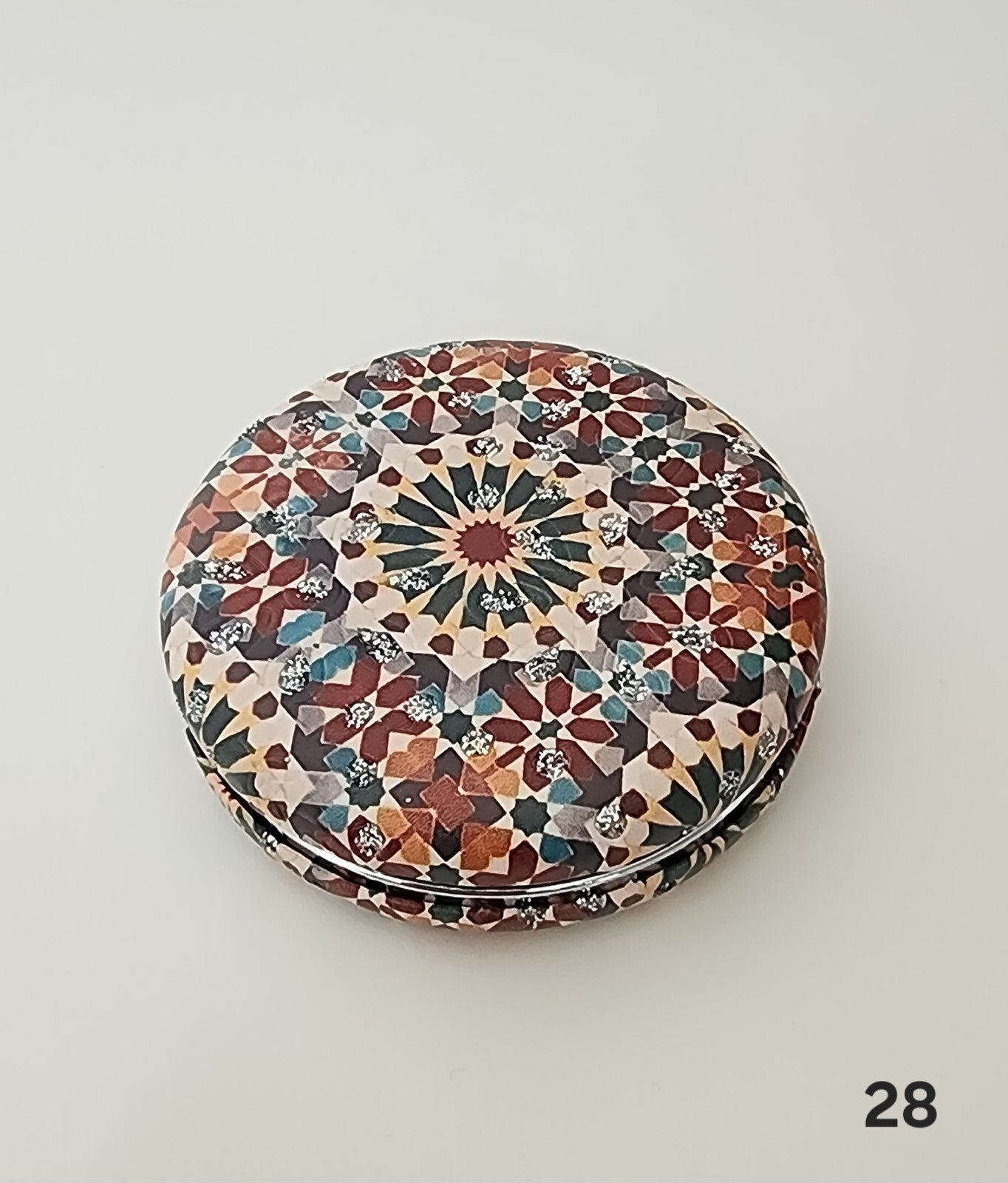 Authentic Moroccan women's multi-shaped/multi-sized mirrors for outdoor use.