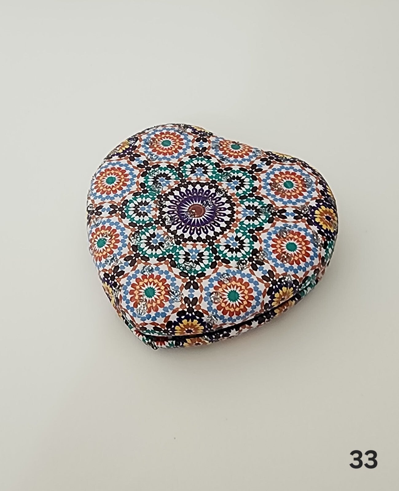 Authentic Moroccan women's multi-shaped/multi-sized mirrors for outdoor use.