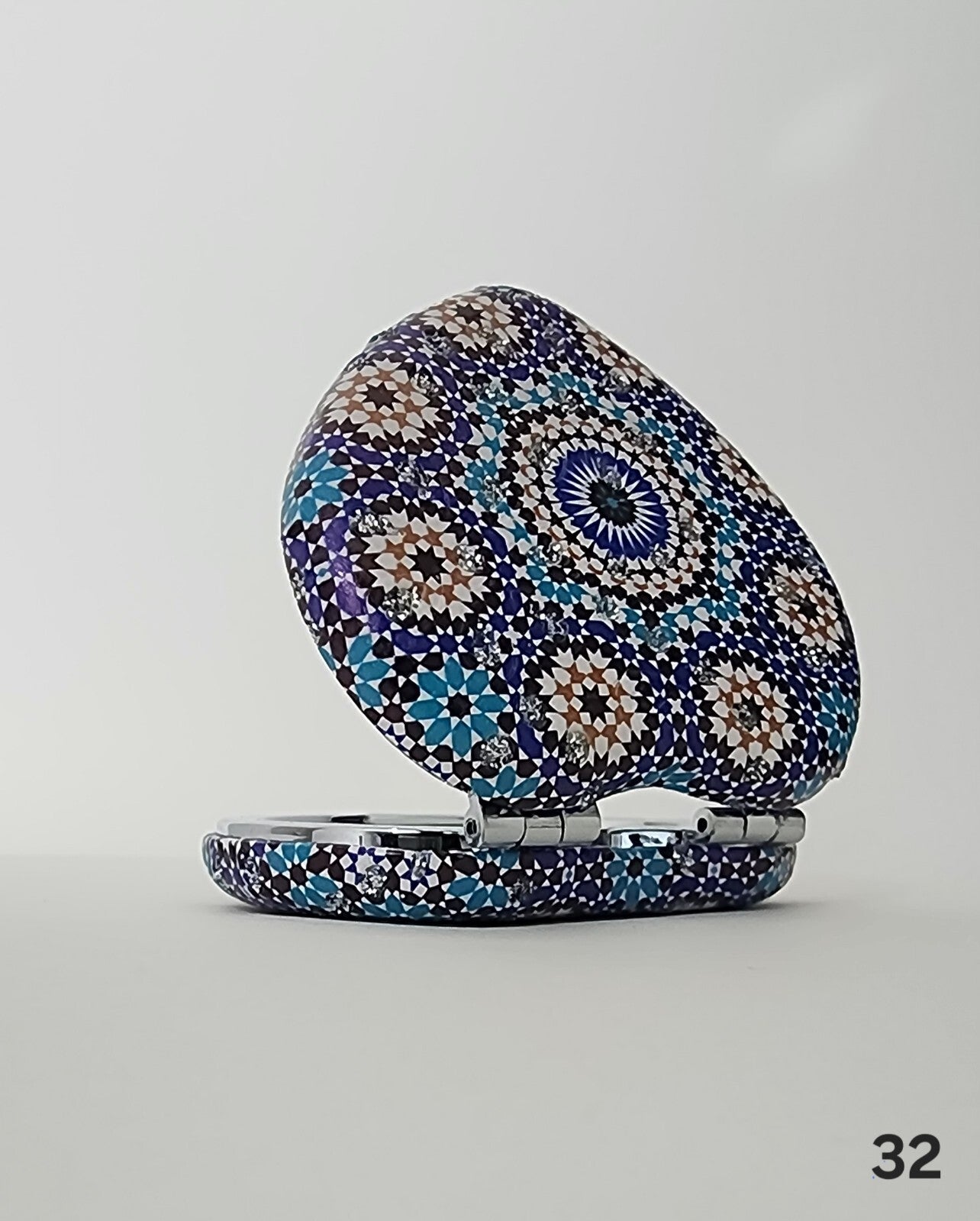 Authentic Moroccan women's multi-shaped/multi-sized mirrors for outdoor use.