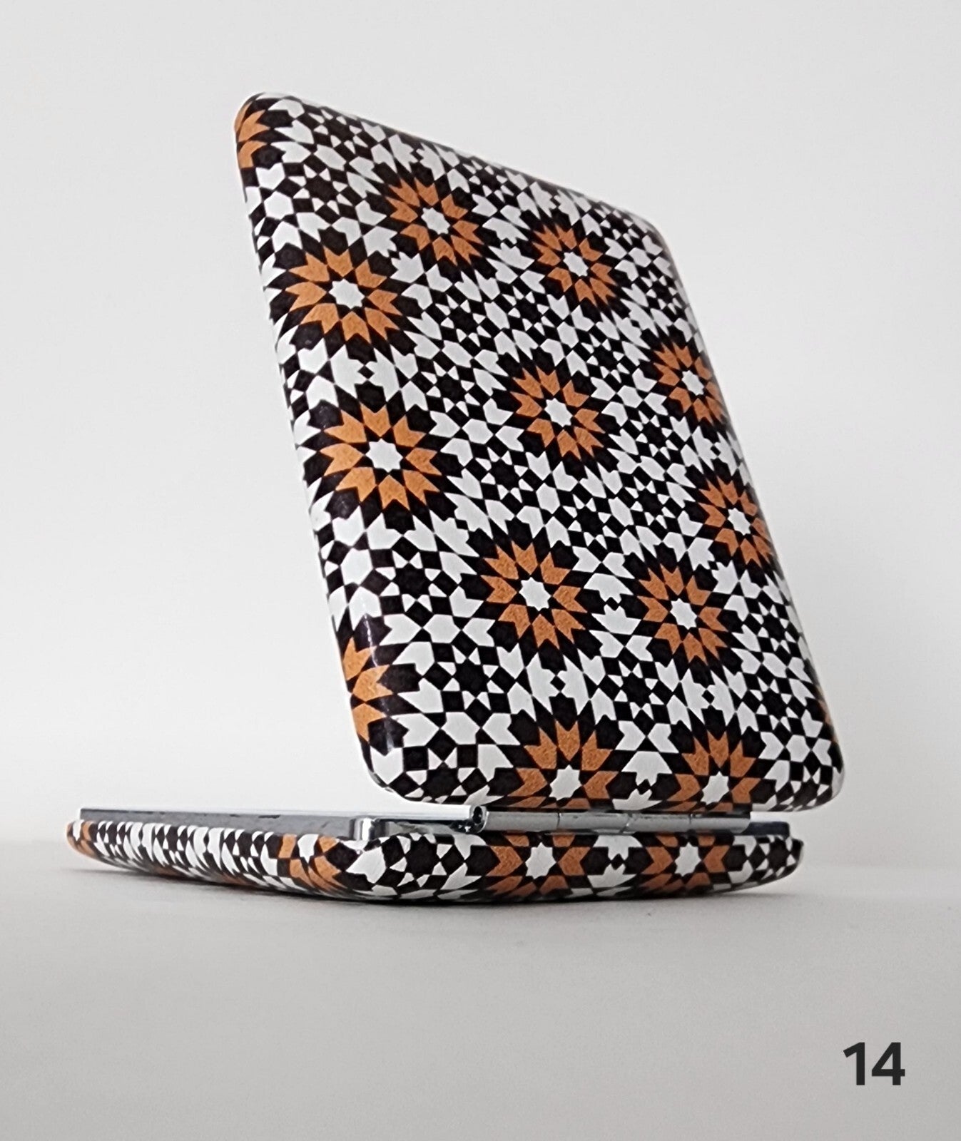 Authentic Moroccan women's multi-shaped/multi-sized mirrors for outdoor use.